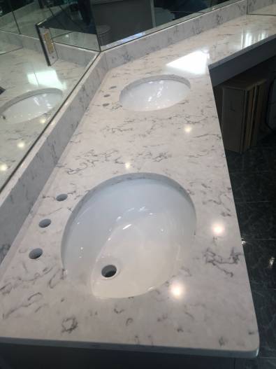 IMG 4780 1 Beautiful Blanco Arebescato vanity with double sinks by Wilstone Inc